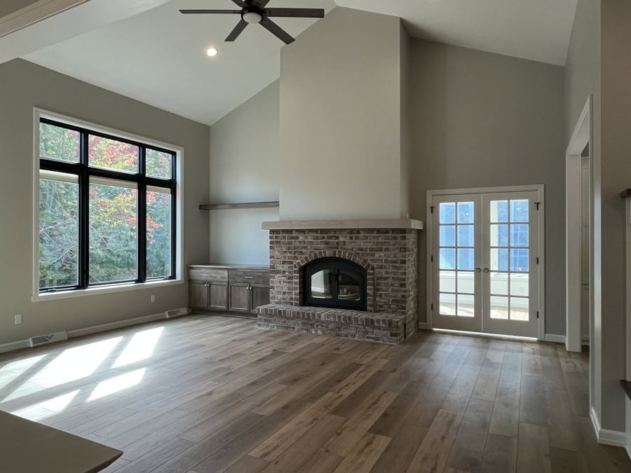 Living room with a brick fireplace