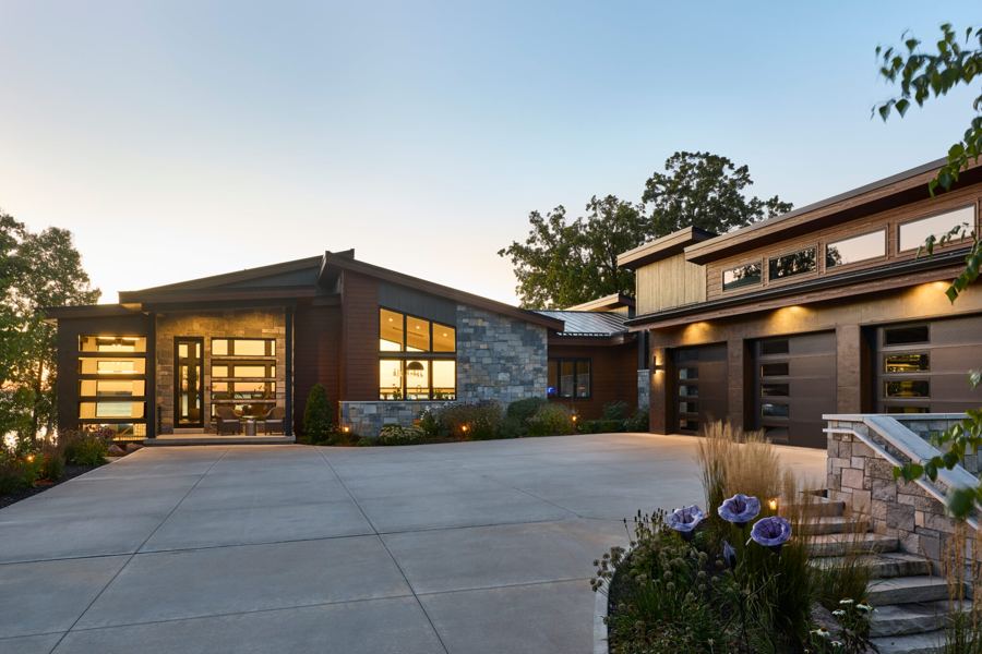 Modern waterfront home at dusk