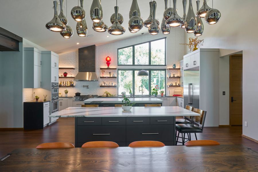 Kitchen with a statement light fixture