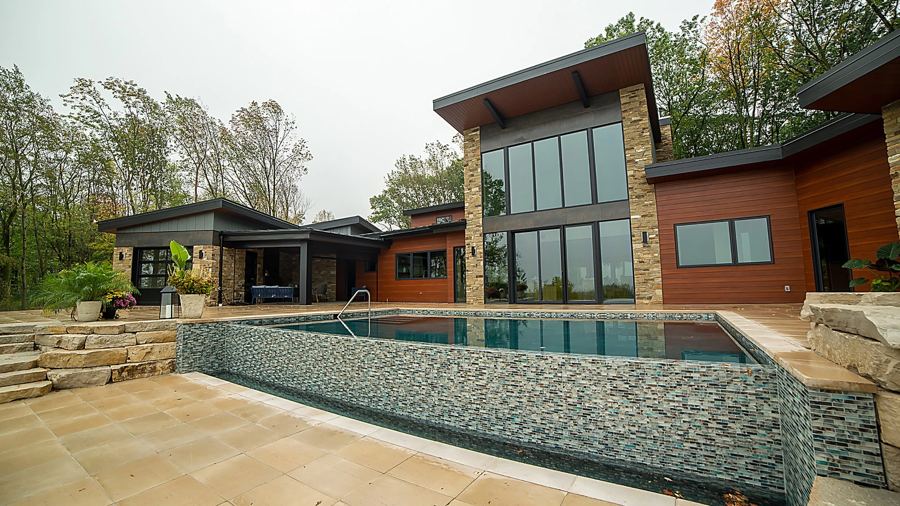 Hillside contemporary home with an infinity-edge pool