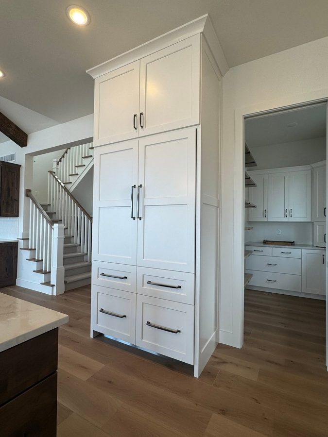 Pantry cabinets and the stair
